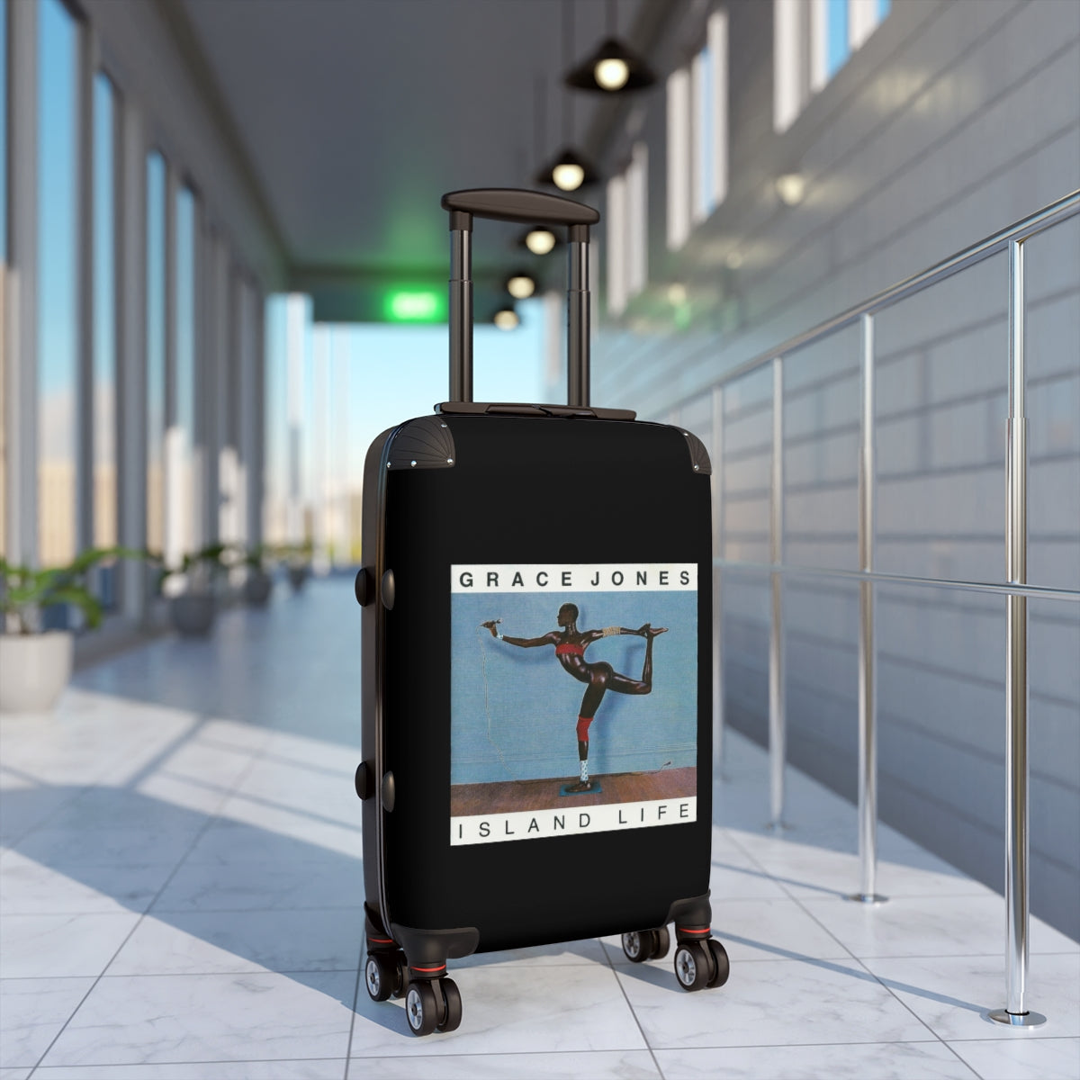 Geotrott Grace Jones Island Life 1985 Black Cabin Suitcase Extended Storage Adjustable Telescopic Handle Double Wheeled Polycarbonate Hard Shell Built In Lock