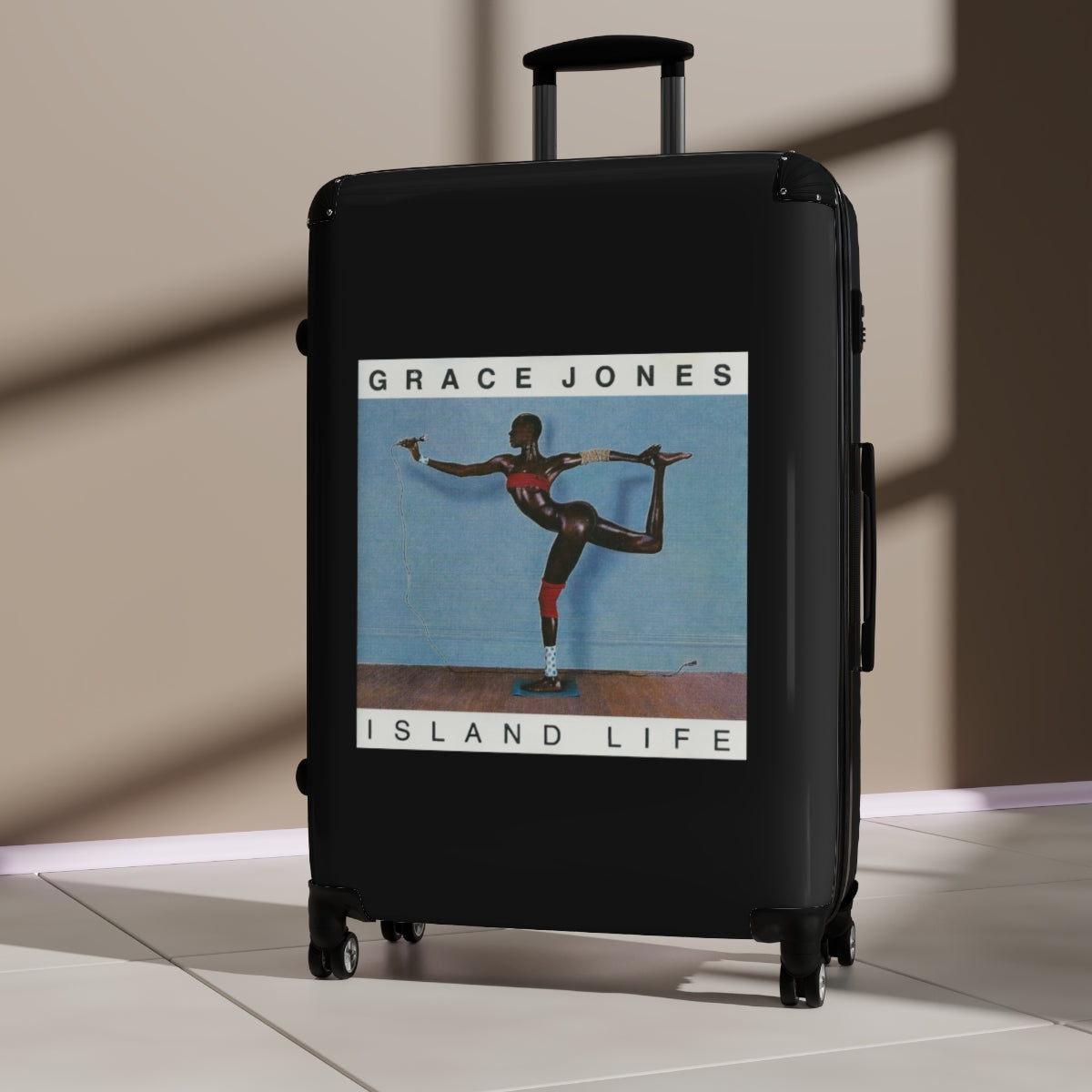 Geotrott Grace Jones Island Life 1985 Black Cabin Suitcase Extended Storage Adjustable Telescopic Handle Double Wheeled Polycarbonate Hard Shell Built In Lock