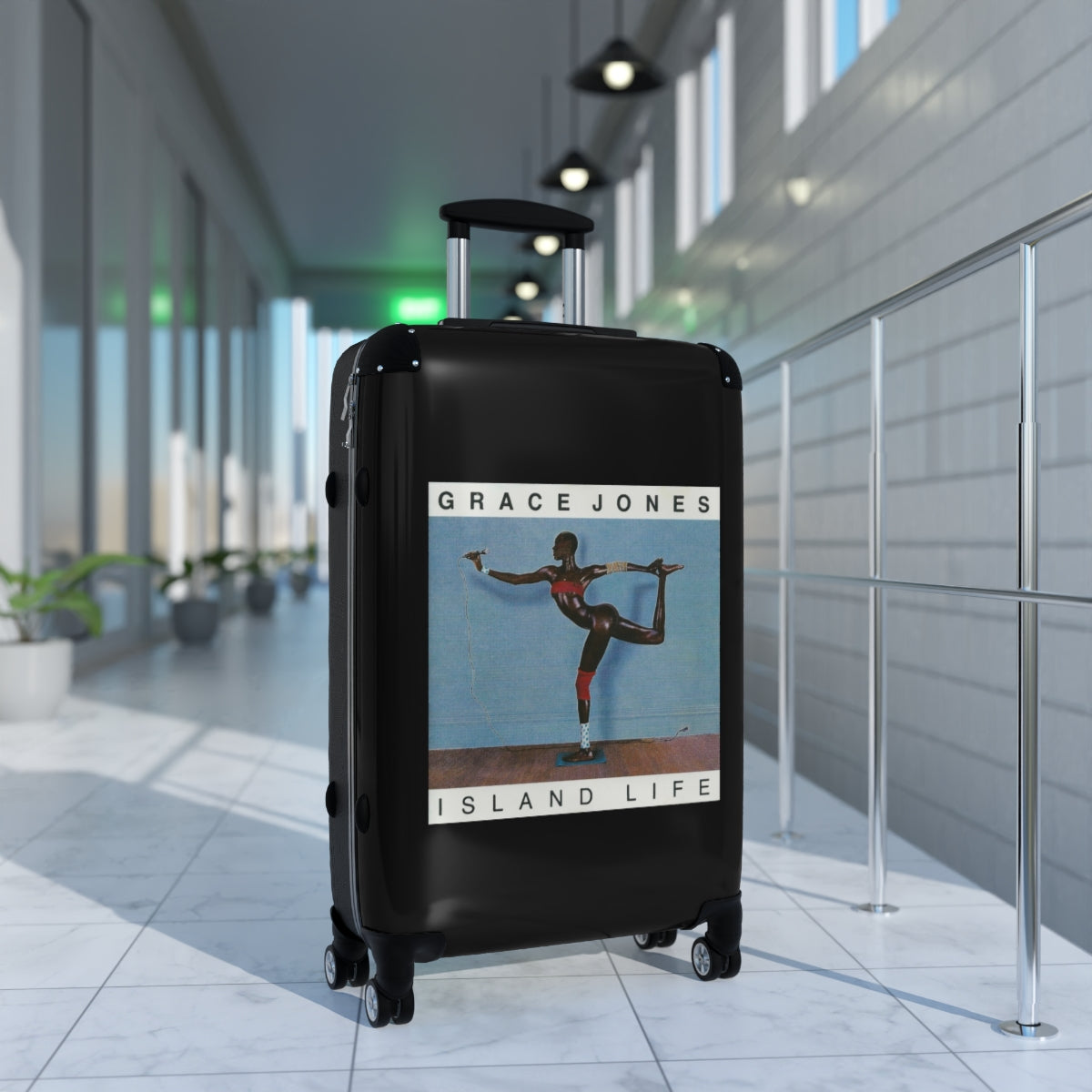 Geotrott Grace Jones Island Life 1985 Black Cabin Suitcase Extended Storage Adjustable Telescopic Handle Double Wheeled Polycarbonate Hard Shell Built In Lock